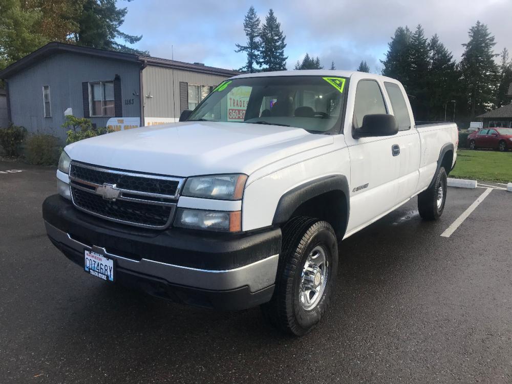 2006 White /Gray Chevrolet 2500 HD LS (1GCHK29U76E) with an 6.0 V8 engine, 6 Speed Automatic transmission, located at 1283 SE Sedgwick Road, Port Orchard, WA, 98366, (360) 876-9300, 47.505535, -122.635643 - This 3-4 ton long box HD Chevrolet features the 6.0 liter V-8, automatic transmission and only has had 2 previous owners from right here in the Northwest. Featuring a Bed Liner, 4 Wheel Drive, LS model with tow package, power group, A-C and much more. Check out the pictures, as this truck is a deal - Photo #1