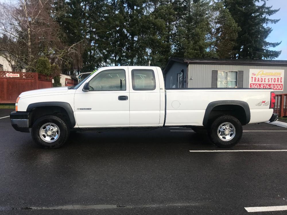 2006 White /Gray Chevrolet 2500 HD LS (1GCHK29U76E) with an 6.0 V8 engine, 6 Speed Automatic transmission, located at 1283 SE Sedgwick Road, Port Orchard, WA, 98366, (360) 876-9300, 47.505535, -122.635643 - This 3-4 ton long box HD Chevrolet features the 6.0 liter V-8, automatic transmission and only has had 2 previous owners from right here in the Northwest. Featuring a Bed Liner, 4 Wheel Drive, LS model with tow package, power group, A-C and much more. Check out the pictures, as this truck is a deal - Photo #2
