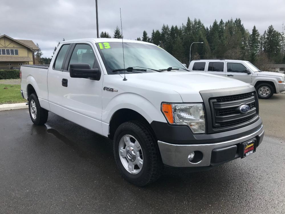 2013 White /Gray Ford F-150 XLT SuperCab 8-ft. Bed 2WD ( 1FTEX1CM8D) with an 3.7L V6 DOHC 24V engine, 6-Speed Automatic transmission, located at 1283 SE Sedgwick Road, Port Orchard, WA, 98366, (360) 876-9300, 47.505535, -122.635643 - Come check out this great family or work truck! Featuring the 3.7-liter V6 with an automatic transmission and FlexFuel, 4-wheel ABS, power Locks/Windows, cruise control, tilt wheel and stereo with CD/FM/AM. Tow Hitch and a Bed-liner. We offer multiple lenders for your convenience and warranty packag - Photo #7