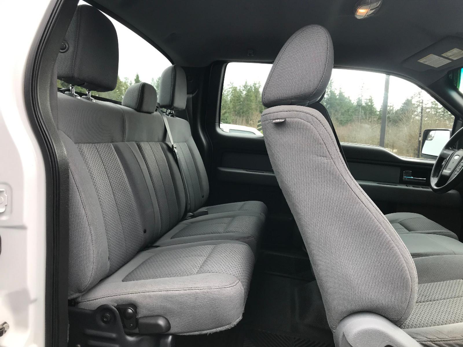 2013 White /Gray Ford F-150 XLT SuperCab 8-ft. Bed 2WD ( 1FTEX1CM8D) with an 3.7L V6 DOHC 24V engine, 6-Speed Automatic transmission, located at 1283 SE Sedgwick Road, Port Orchard, WA, 98366, (360) 876-9300, 47.505535, -122.635643 - Come check out this great family or work truck! Featuring the 3.7-liter V6 with an automatic transmission and FlexFuel, 4-wheel ABS, power Locks/Windows, cruise control, tilt wheel and stereo with CD/FM/AM. Tow Hitch and a Bed-liner. We offer multiple lenders for your convenience and warranty packag - Photo #12