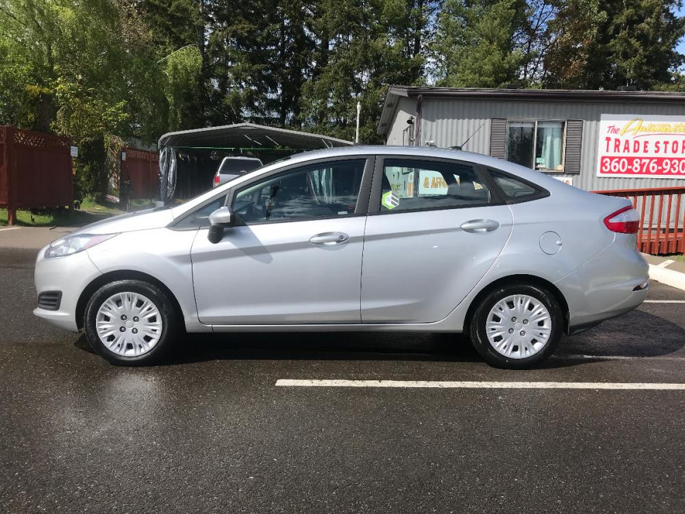 2018 Silver /Black Ford Fiesta S Sedan (3FADP4AJ5JM) with an 1.6L L4 DOHC 16V engine, 5-Speed Automatic transmission, located at 1283 SE Sedgwick Road, Port Orchard, WA, 98366, (360) 876-9300, 47.505535, -122.635643 - **Dealer Statement**, The Trade Store offers the nicest previously owned inventory you'll find along with a broad selection of cars, vans, trucks and more. We offer many banks, credit unions and special financing options to fit your needs regardless of your credit, as well as, sourcing of specific v - Photo #2