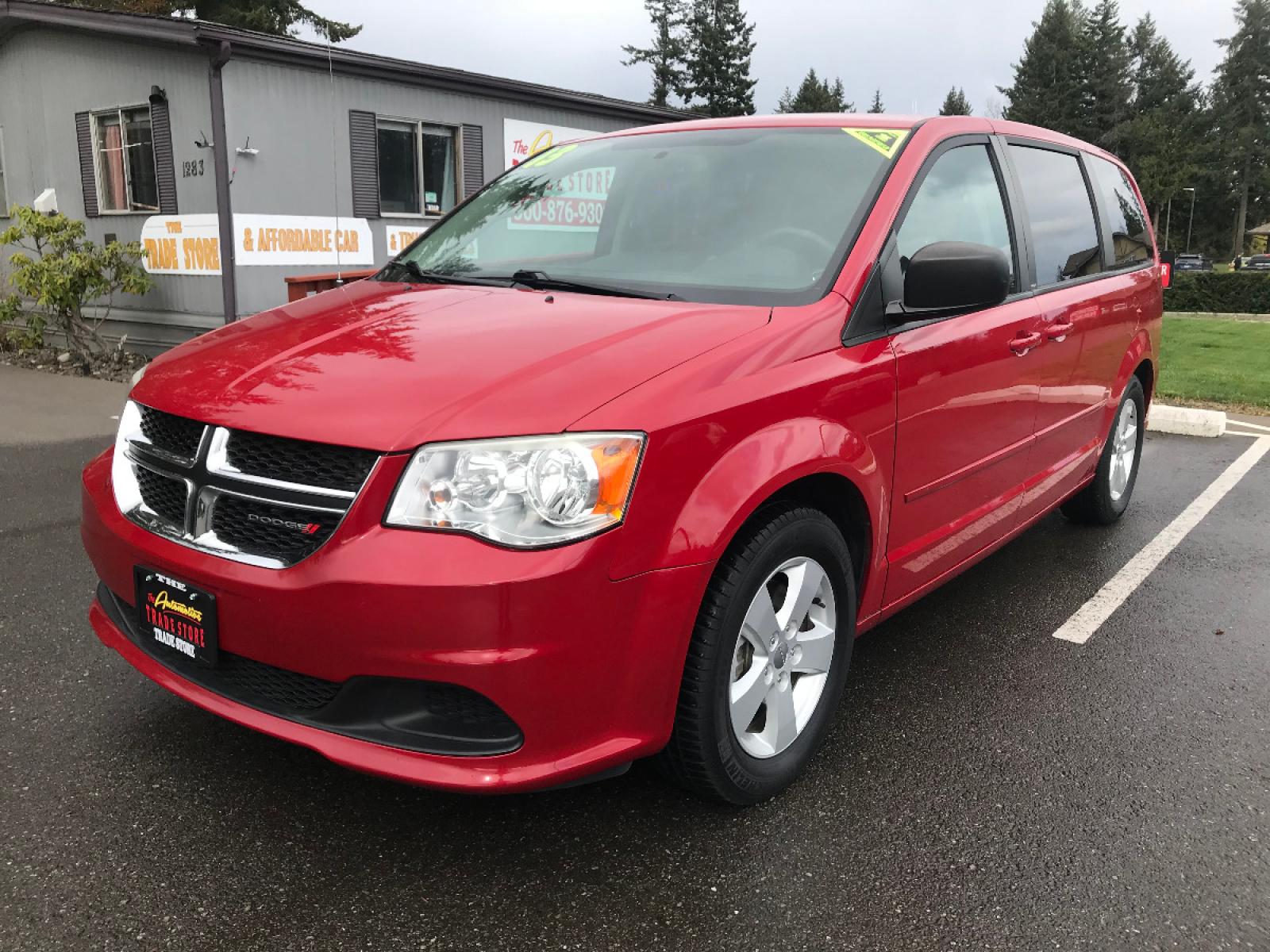 2013 Red /Black Dodge Grand Caravan SE (2C4RDGBG2DR) with an 3.6L V6 DOHC 24V engine, 6-Speed Automatic transmission, located at 1283 SE Sedgwick Road, Port Orchard, WA, 98366, (360) 876-9300, 47.505535, -122.635643 - **Dealer Statement: The Trade Store offers the nicest previously owned inventory you'll find of cars, vans, trucks and more. We offer many banks, credit unions and special financing options to fit your needs regardless of your credit, as well as sourcing of specific vehicles for qualified customers - Photo #0
