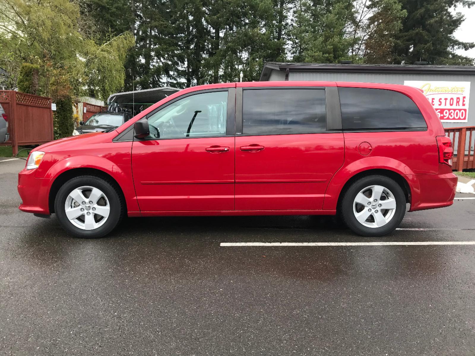 2013 Red /Black Dodge Grand Caravan SE (2C4RDGBG2DR) with an 3.6L V6 DOHC 24V engine, 6-Speed Automatic transmission, located at 1283 SE Sedgwick Road, Port Orchard, WA, 98366, (360) 876-9300, 47.505535, -122.635643 - Well maintained Affordable Car Rentals unit. Call for details and your appointment as this vehicle could be out on rental at any time. We can help arrange financing and warranty purchases too. Visit our website for more photos at thetradestorevehicles.com **Dealer Statement: The Trade Store offer - Photo #2
