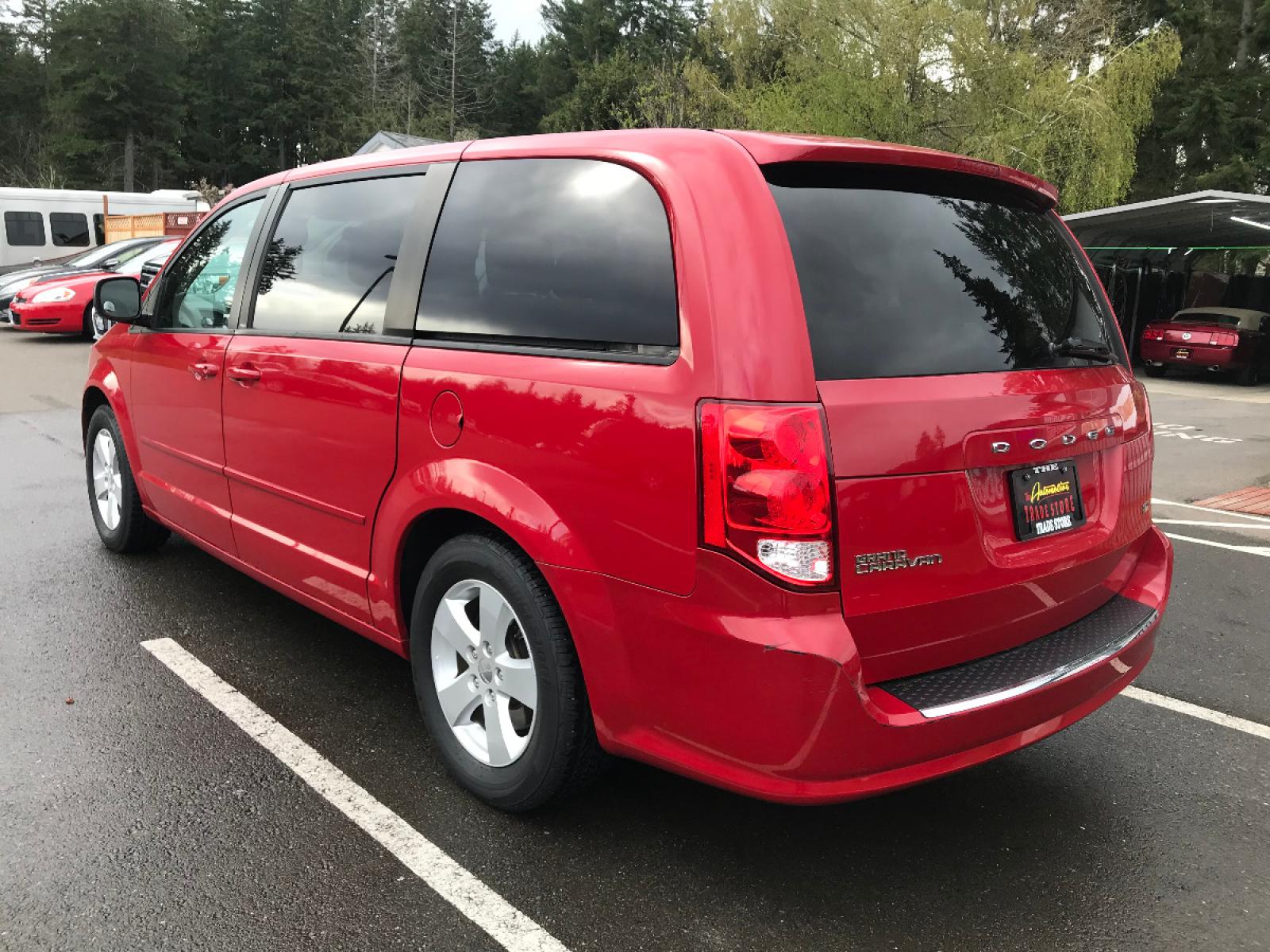 2013 Red /Black Dodge Grand Caravan SE (2C4RDGBG2DR) with an 3.6L V6 DOHC 24V engine, 6-Speed Automatic transmission, located at 1283 SE Sedgwick Road, Port Orchard, WA, 98366, (360) 876-9300, 47.505535, -122.635643 - Well maintained Affordable Car Rentals unit. Call for details and your appointment as this vehicle could be out on rental at any time. We can help arrange financing and warranty purchases too. Visit our website for more photos at thetradestorevehicles.com **Dealer Statement: The Trade Store offer - Photo #3