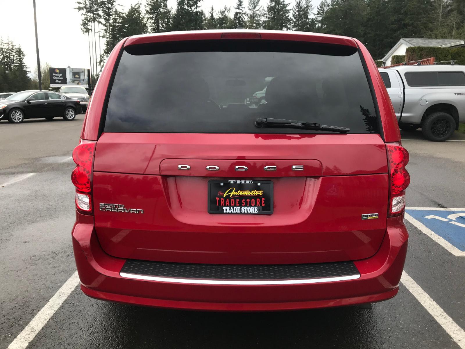 2013 Red /Black Dodge Grand Caravan SE (2C4RDGBG2DR) with an 3.6L V6 DOHC 24V engine, 6-Speed Automatic transmission, located at 1283 SE Sedgwick Road, Port Orchard, WA, 98366, (360) 876-9300, 47.505535, -122.635643 - Well maintained Affordable Car Rentals unit. Call for details and your appointment as this vehicle could be out on rental at any time. We can help arrange financing and warranty purchases too. Visit our website for more photos at thetradestorevehicles.com **Dealer Statement: The Trade Store offer - Photo #4