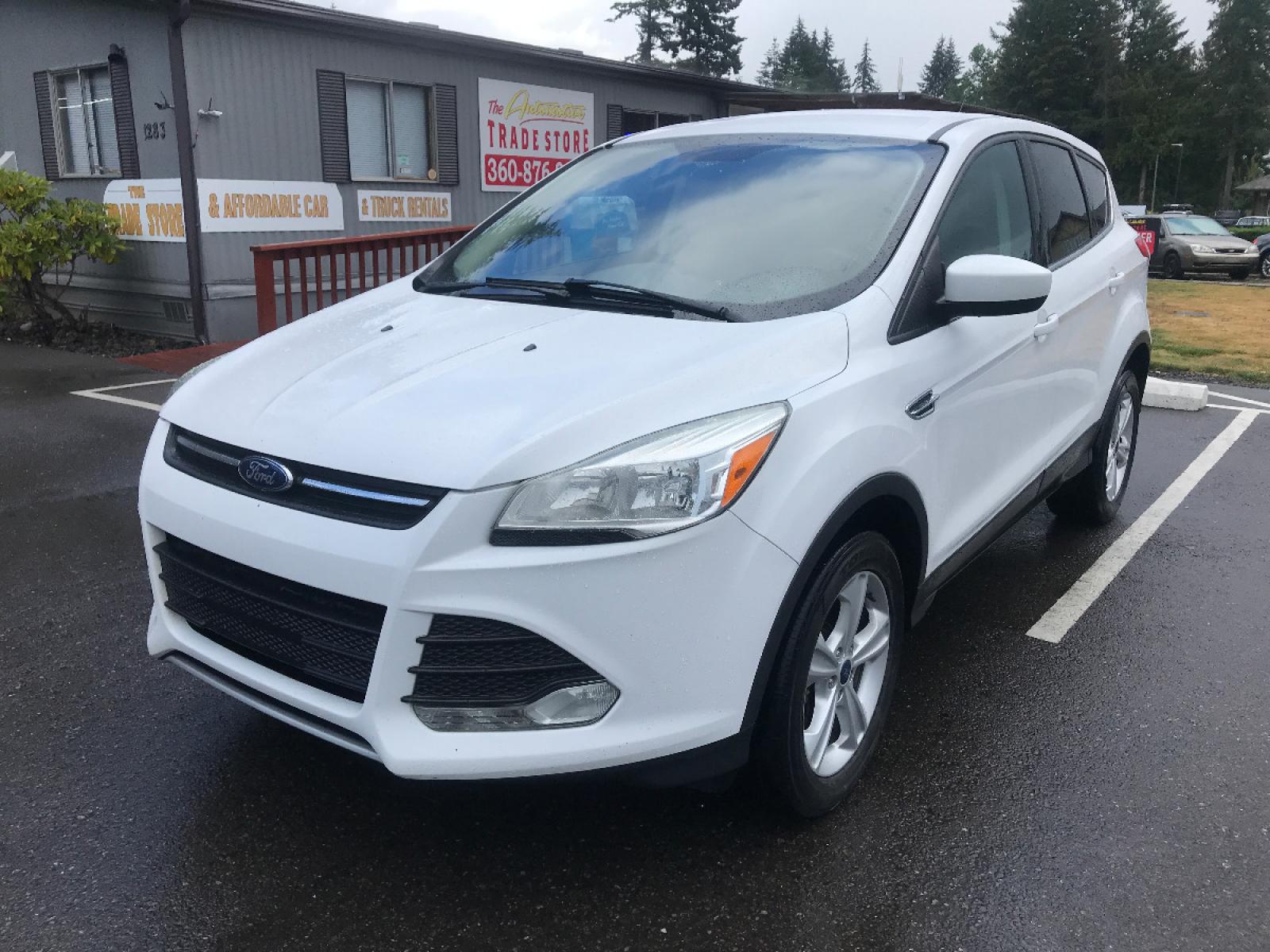 2014 White /White Ford Escape SE 4WD (1FMCU9GX7EU) with an 1.6L L4 DOHC 16V engine, 6-Speed Automatic transmission, located at 1283 SE Sedgwick Road, Port Orchard, WA, 98366, (360) 876-9300, 47.505535, -122.635643 - **Dealer Statement**, The Trade Store offers the nicest previously owned inventory you'll find along with a broad selection of cars, vans, trucks and more. We offer many banks, credit unions and special financing options to fit your needs regardless of your credit, as well as, sourcing of specific v - Photo #0