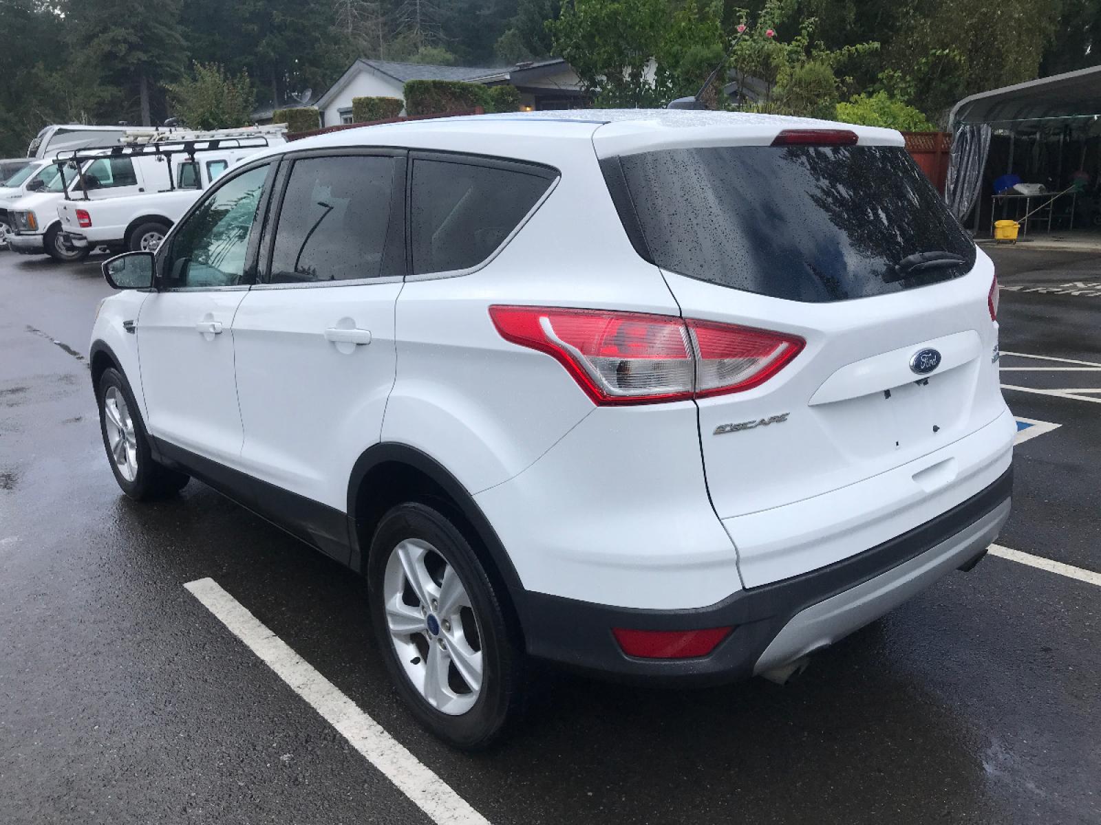 2014 White /White Ford Escape SE 4WD (1FMCU9GX7EU) with an 1.6L L4 DOHC 16V engine, 6-Speed Automatic transmission, located at 1283 SE Sedgwick Road, Port Orchard, WA, 98366, (360) 876-9300, 47.505535, -122.635643 - **Dealer Statement**, The Trade Store offers the nicest previously owned inventory you'll find along with a broad selection of cars, vans, trucks and more. We offer many banks, credit unions and special financing options to fit your needs regardless of your credit, as well as, sourcing of specific v - Photo #1