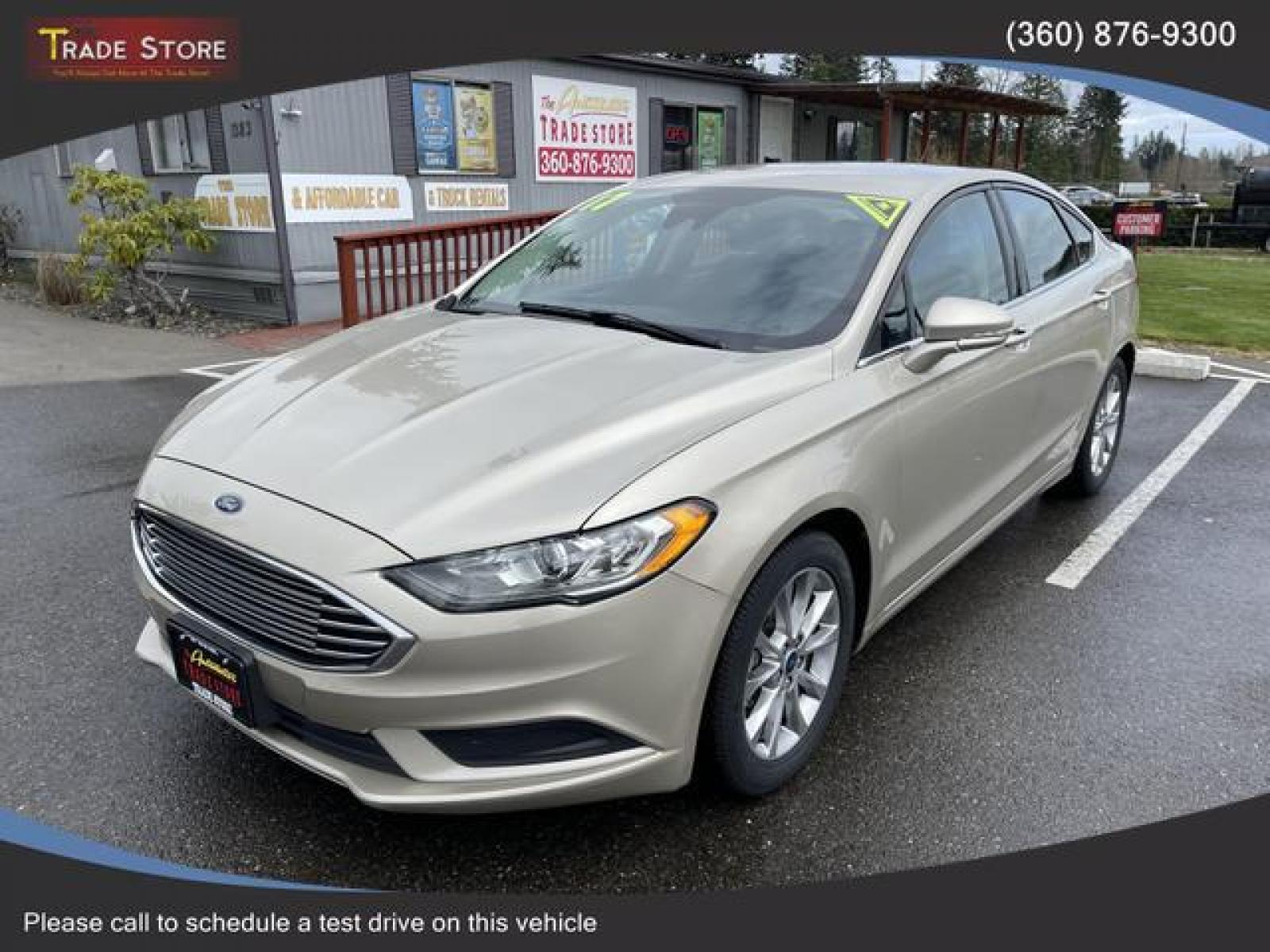 2017 Gold /Black Ford Fusion SE Sedan 4D (3FA6P0H78HR) with an 2.5L L4 DOHC 16V engine, Auto, 6-Spd SelectShift transmission, located at 1283 SE Sedgwick Road, Port Orchard, WA, 98366, (360) 876-9300, 47.505535, -122.635643 - **Dealer Statement: The Trade Store offers the nicest previously owned inventory you'll find of cars, vans, trucks and more. We offer many banks, credit unions and special financing options to fit your needs regardless of your credit, as well as sourcing of specific vehicles for qualified custom - Photo #1