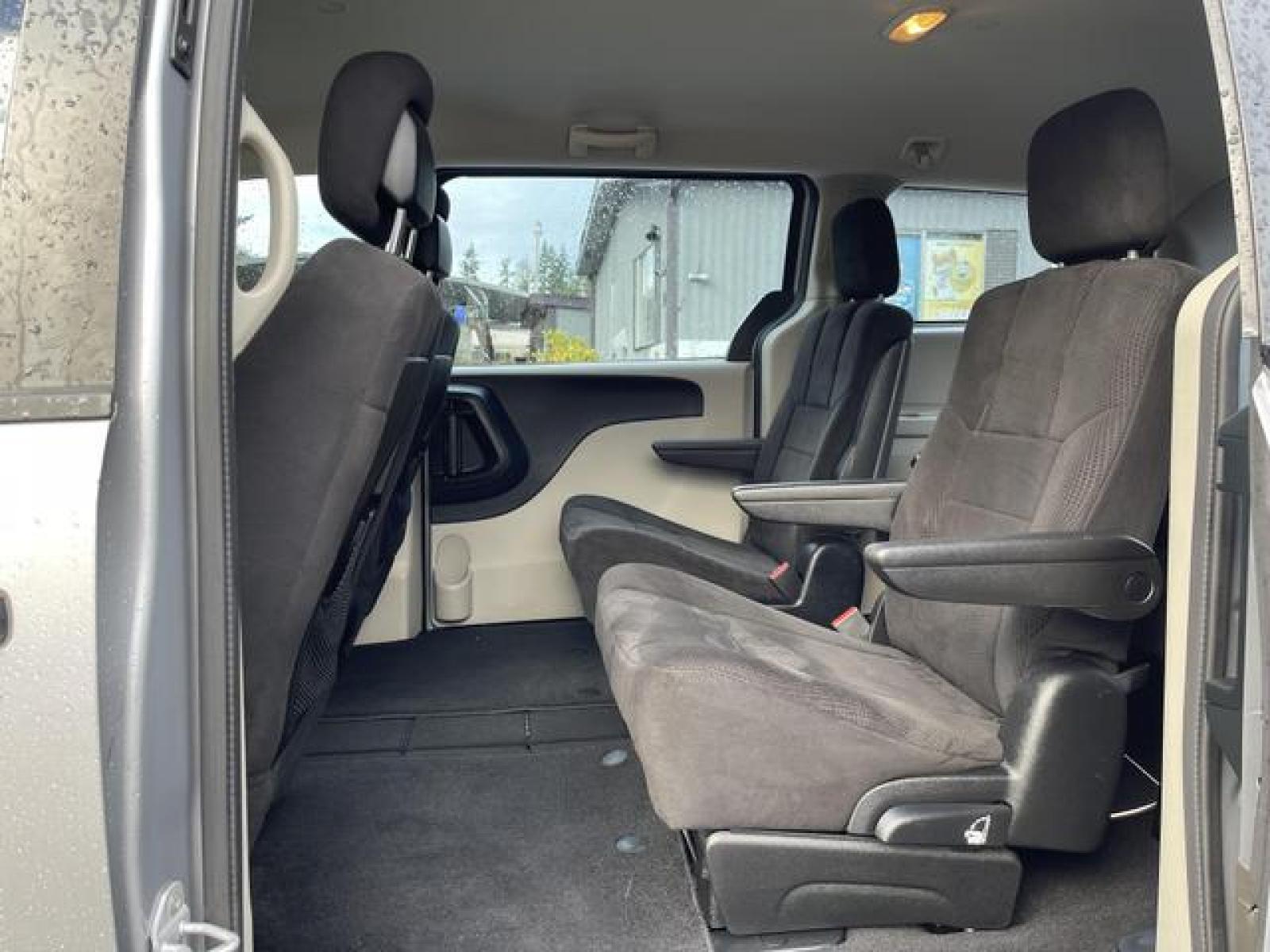 2013 Silver /Black Dodge Grand Caravan Passenger AVP Minivan 4D (2C4RDGBG8DR) with an 3.6L V6 DOHC 24V engine, Automatic, 6-Spd transmission, located at 1283 SE Sedgwick Road, Port Orchard, WA, 98366, (360) 876-9300, 47.505535, -122.635643 - **Dealer Statement: The Trade Store offers the nicest previously owned inventory you'll find of cars, vans, trucks and more. We offer many banks, credit unions and special financing options to fit your needs regardless of your credit, as well as sourcing of specific vehicles for qualified custom - Photo #4